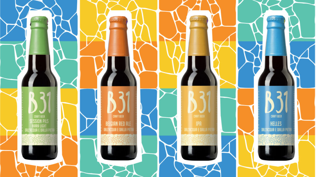 Quattro birre artigianali B31 della linea Color Craft, ciascuna con etichetta di colore diverso: Session Pils con etichetta verde, Belgian Red Ale con etichetta arancione, IPA con etichetta gialla, Helles con etichetta azzurra, su sfondi che riprendono i colori delle birre.