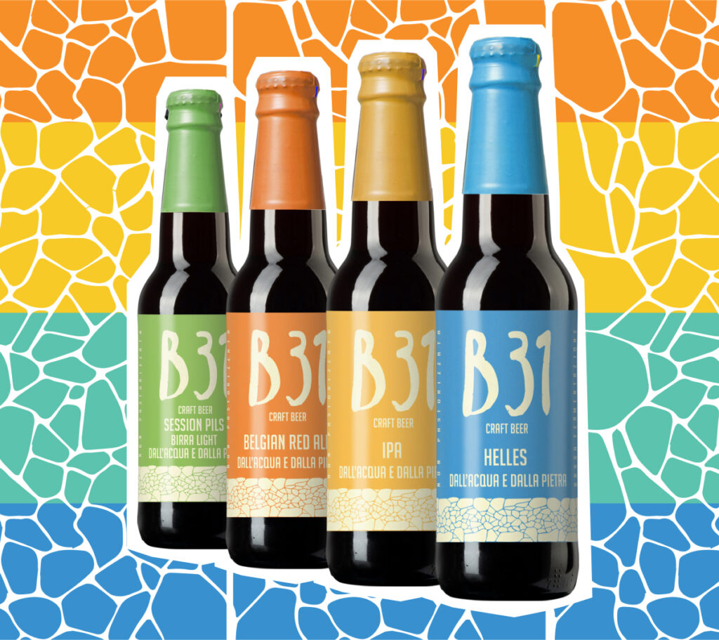 Quattro birre artigianali B31 della linea Color Craft, ciascuna con etichetta di colore diverso: Session Pils con etichetta verde, Belgian Red Ale con etichetta arancione, IPA con etichetta gialla, Helles con etichetta azzurra, su sfondi che riprendono i colori delle birre.